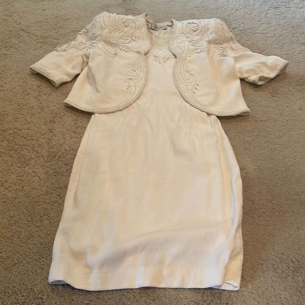 Strapless dress with jacket. Both are beautifully beaded with pearls